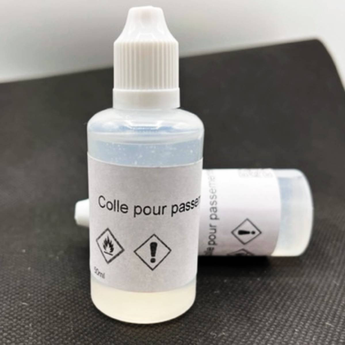 Colle transparente pour passementerie 